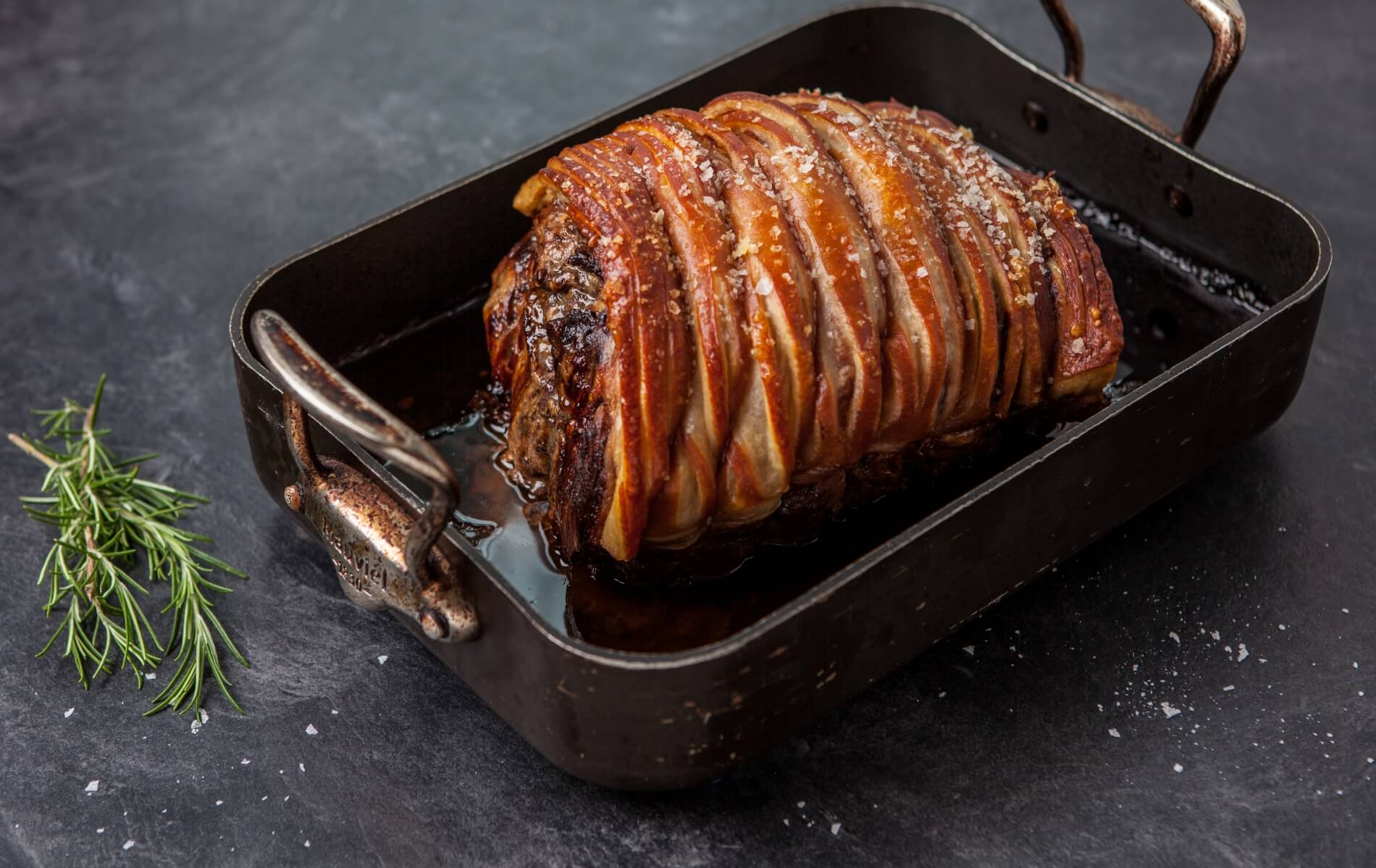 Pork joint in a roasting tin