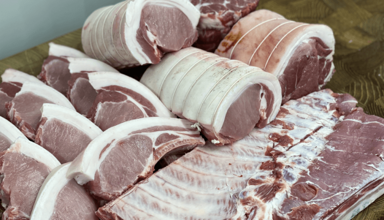 Various uncooked cuts of Tamworth pork including pork chops and pork loins